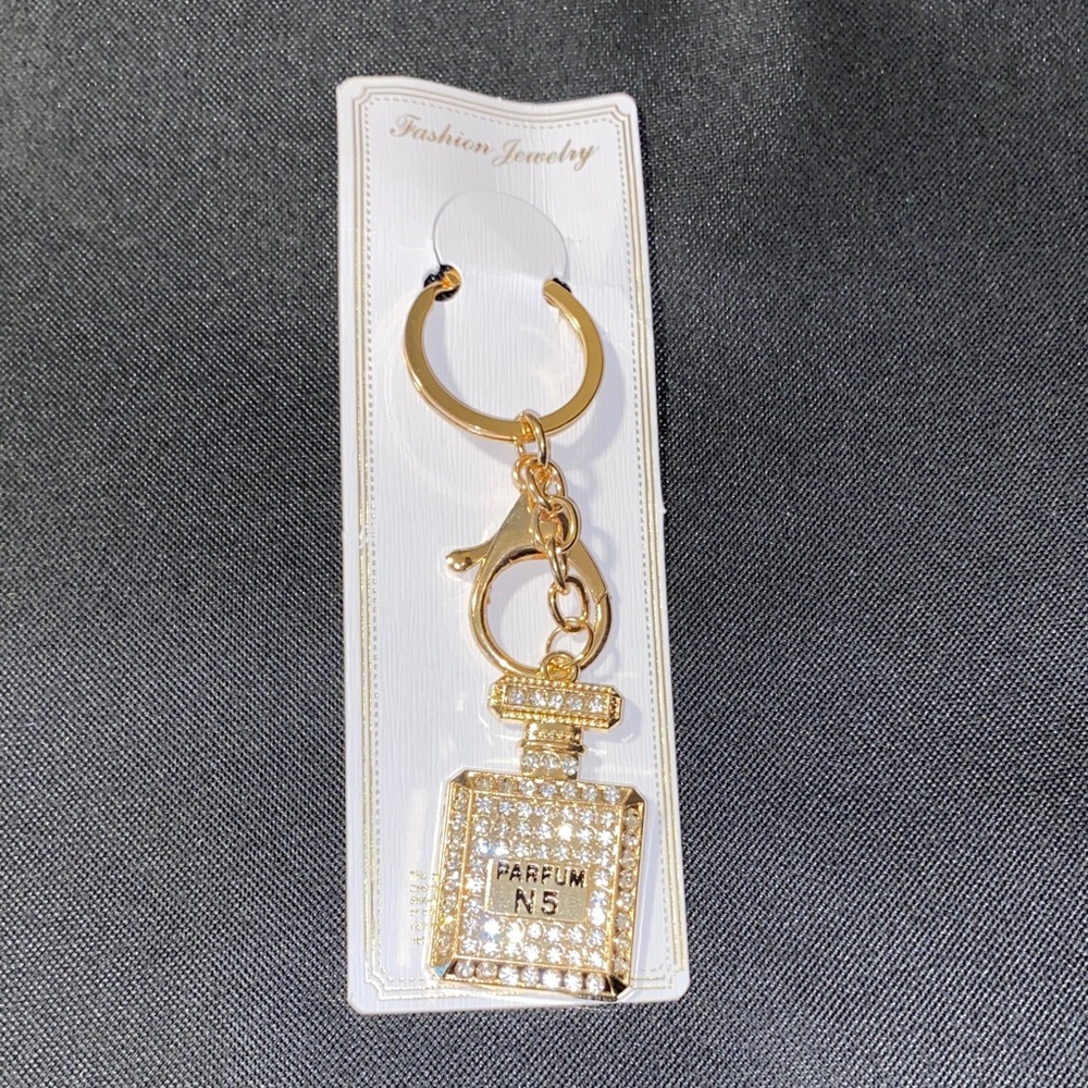Elegant Gold Perfume Bottle Key Holder